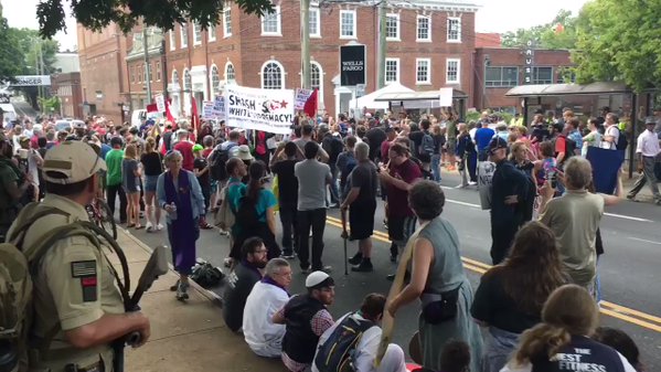 Charlottesville: Cheers from the counter-protest as the communist Workers World Party arrives at Emancipation Park  