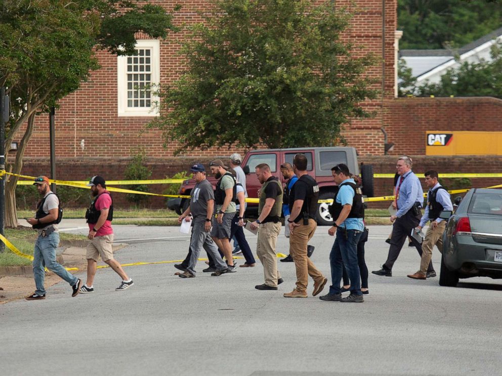 Two law enforcement sources confirmed  that DeWayne Craddock, 40, a recently terminated city employee, is the alleged suspect in the Virginia Beach municipal center shooting that killed at least 12 people.    
