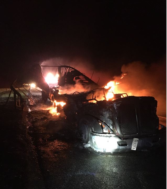 Single left lane gets by scene of early morning tractor trailer fire on WB I-66 at the 18 mile marker in Fauquier Co. Tow on scene working on plan to removed burned wreckage. No injuries