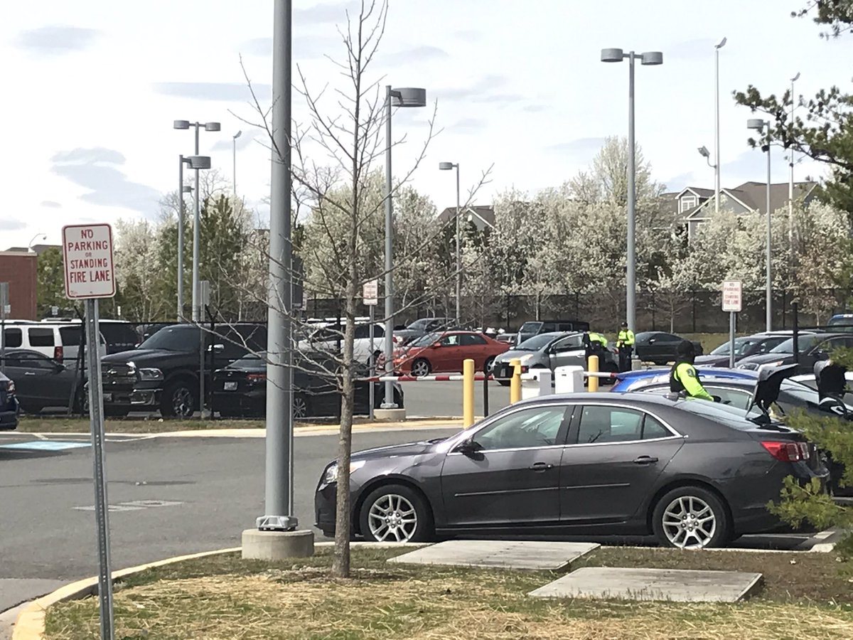 This is the District 2 station in Springfield where the Metro Transit Police officer who tested positive for COVID19 works. two people in full hazmat suits in the parking lot. Metro says the whole building is being cleaned