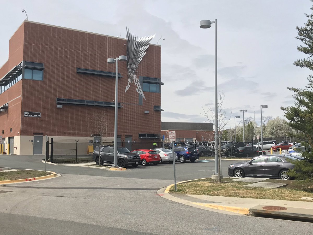 This is the District 2 station in Springfield where the Metro Transit Police officer who tested positive for COVID19 works. two people in full hazmat suits in the parking lot. Metro says the whole building is being cleaned