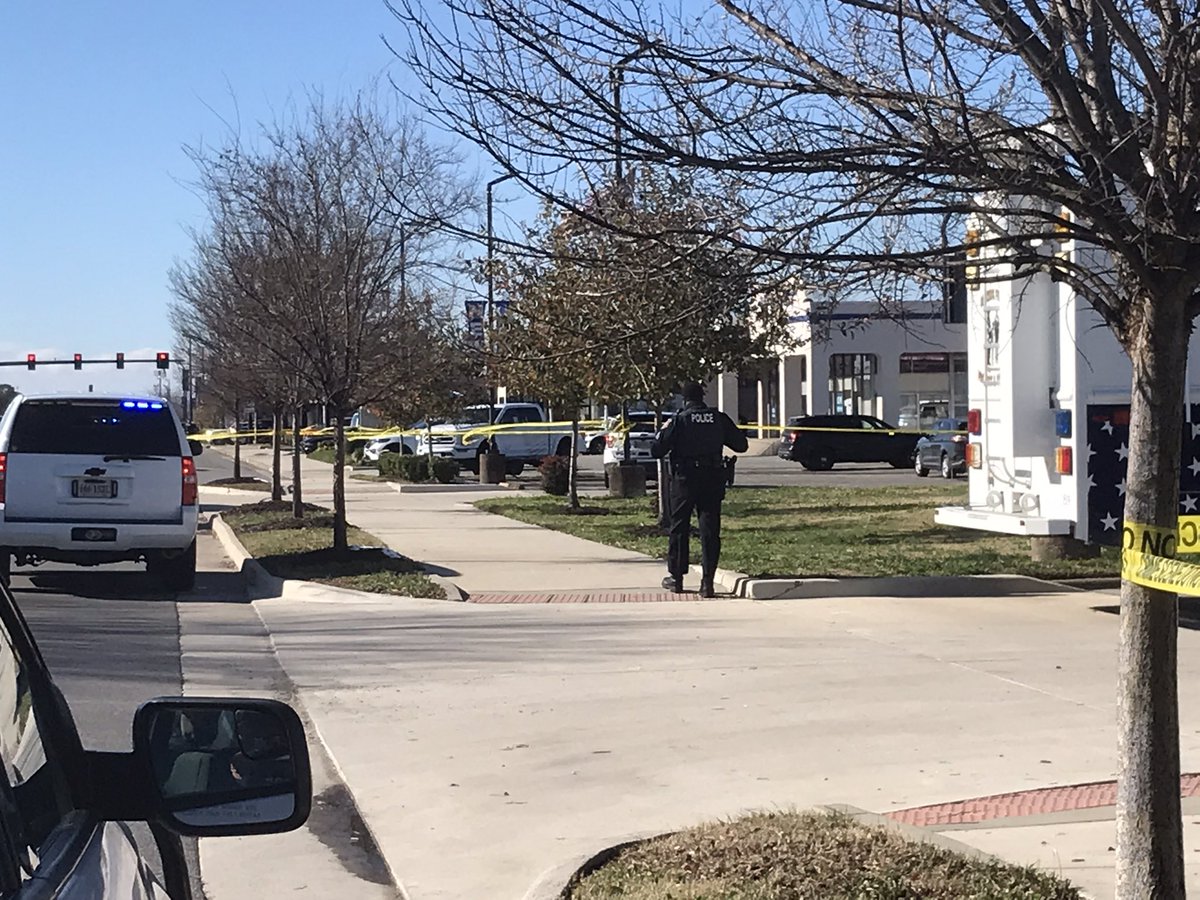 A call about an disorderly adult male with a bat at Wynne Ford on Mercury Blvd. Suspect hit responding officer with  the bat, police say, & was shot. Taken to hospital, may not survive