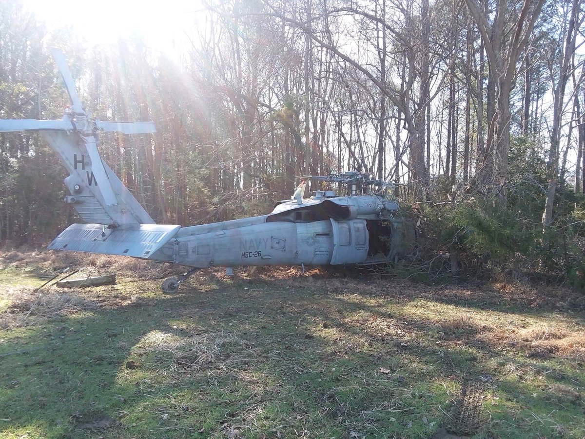 This Navy helicopter made an emergency landing. The two people on board suffered non-life threatening injuries