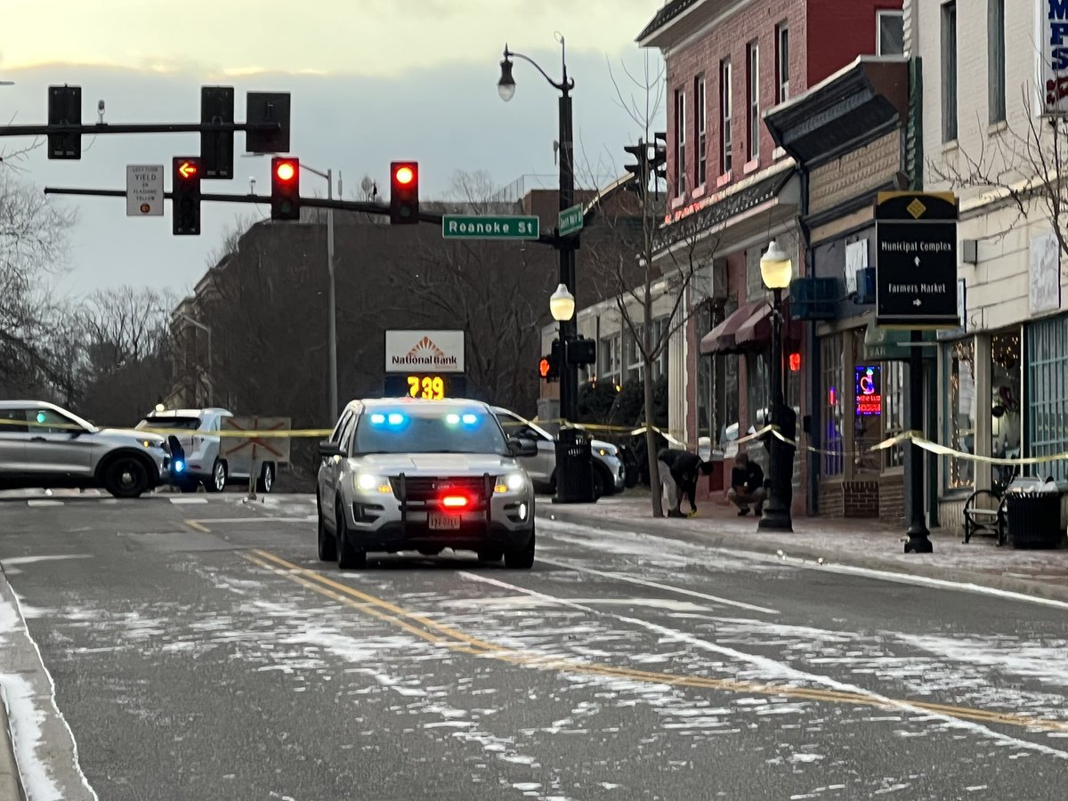 Police are marking evidence at the scene of the deadly shooting in downtown @Blacksburg_Gov