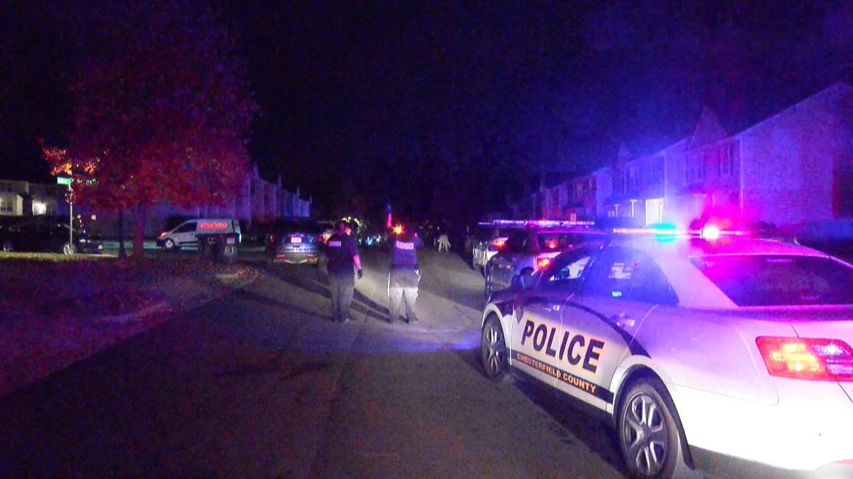 Police cars and forensic teams lined Timsberry Circle to investigate an officer-involved shooting that took place in this neighborhood. 