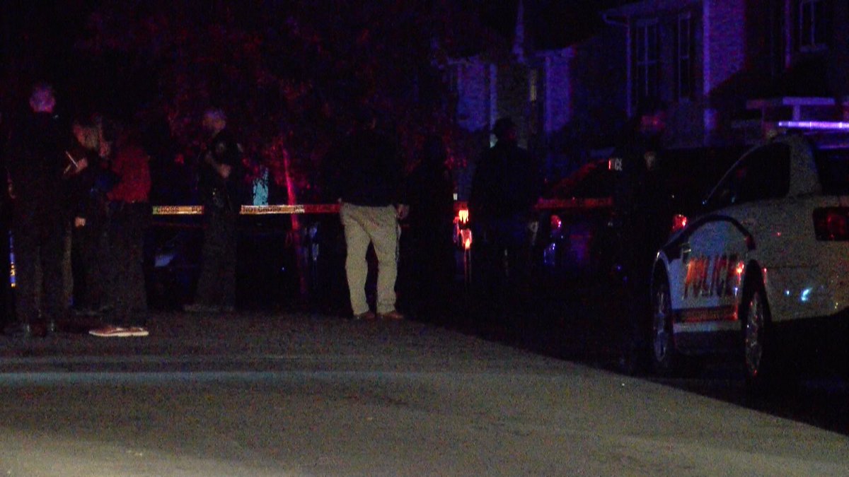 Police cars and forensic teams lined Timsberry Circle to investigate an officer-involved shooting that took place in this neighborhood. 