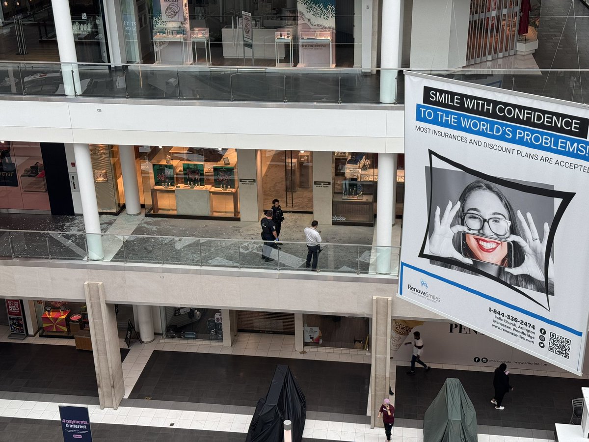 Incoming photos from inside Pentagon City Mall with an incident involving multiple individuals who smashed glass at a jewelry store and took property. Those individuals fled the Mall on foot.  