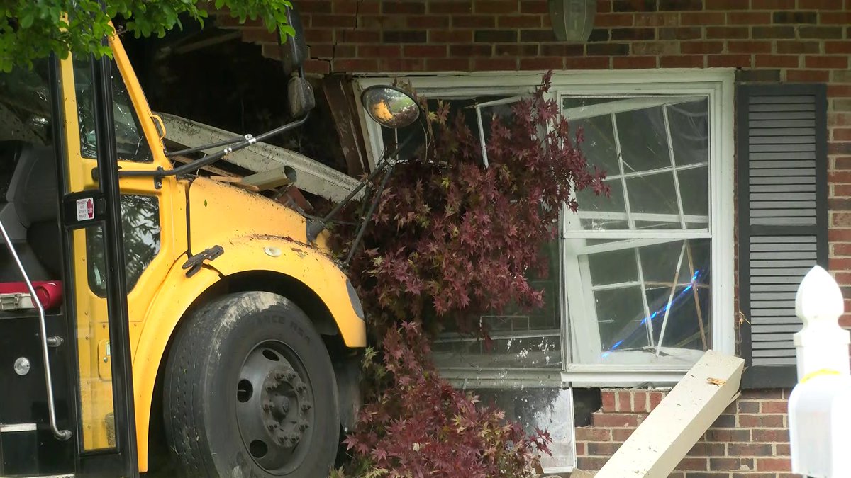 2 children taken to the hospital after bus crashes into house