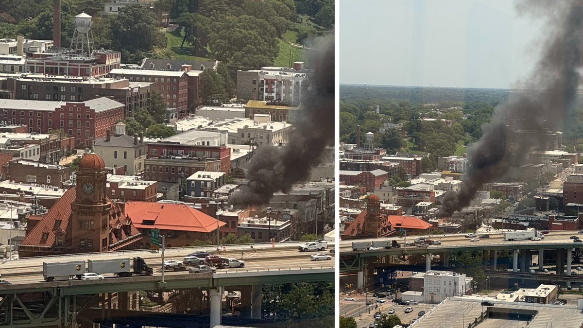 Police and firefighters are on scene at a fire at 1700 E Main Street near Main Street Station in Richmond's Shockoe Bottom